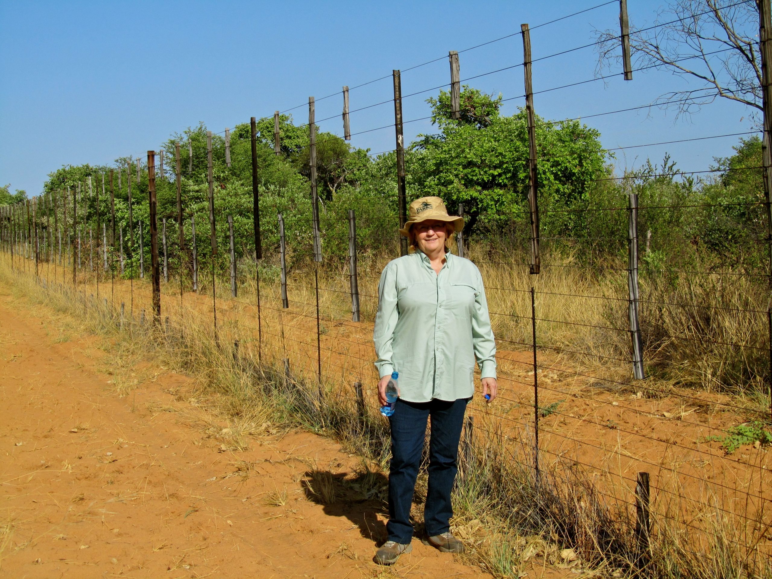 High fences serve to keep game animals from straying to adjacent livestock properties and help to keep predators and diseases out.